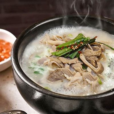  Dwaeji Gukbap: Un Caldo Reconfortante Con Una Sinfonía de Sabores Ahumados y Picantes